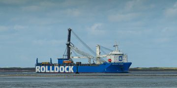 Maior guindaste portuário móvel, OMDN, O Mundo dos Negócios