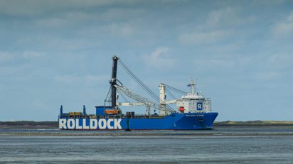 Maior guindaste portuário móvel, OMDN, O Mundo dos Negócios